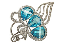 Срібні брошки